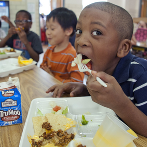 kid eating at school