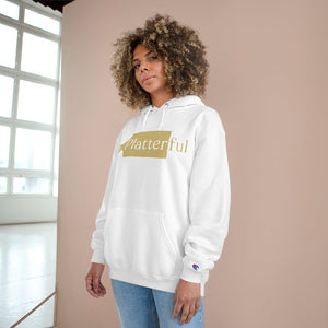 A white Champion hoodie with a gold Platterful logo on the front.