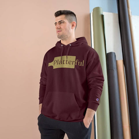 A maroon Champion hoodie with a gold Platterful logo on the front.