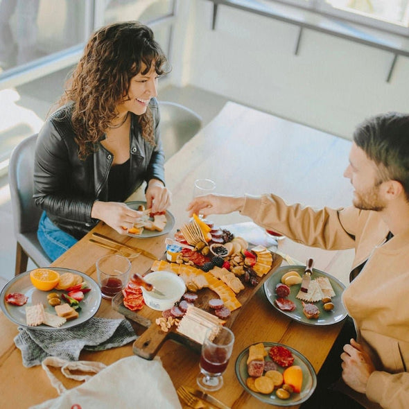 The perfect date-night-in with a Platterful Charcuterie Board.