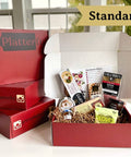 Standard Platterful Charcuterie Kit - Cheese, meat, crackers, spreadables, olives, nuts and chocolates. Everything you need to create the best charcuterie board. Estimated serving size: feeds 2-4 as a small appetizer or 1-2 as a meal