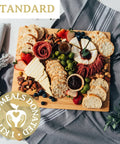 Standard Platterful Charcuterie Kit - Cheese, meat, crackers, spreadables, olives, nuts and chocolates. Everything you need to create the best charcuterie board that is sure to leave your friends and family drooling. Estimated serving size: Small charcuterie board feeds 2-4 as a small appetizer or 1-2 as a meal