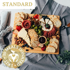 Standard Platterful Charcuterie Kit - Cheese, meat, crackers, spreadables, olives, nuts and chocolates. Everything you need to create the best charcuterie board that is sure to leave your friends and family drooling. Estimated serving size: Small charcuterie board feeds 2-4 as a small appetizer or 1-2 as a meal